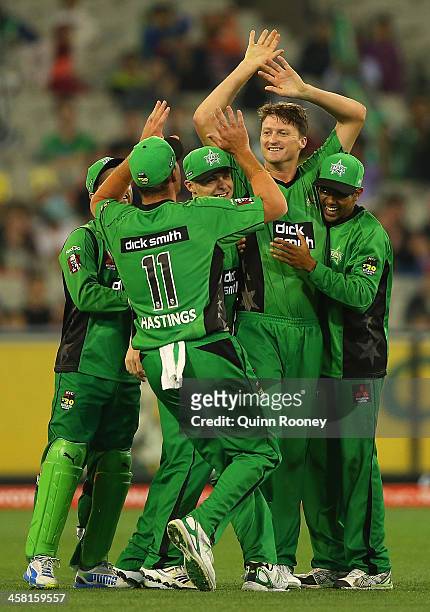 Jackson Bird of the Stars is congratulated by team mates after taking the wicket of Joseph Buttler of the Renegades during the Big Bash League match...