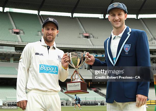 Matthew Wade of the Bushrangers and Peter Nevill of the Blues pose during day one of the Sheffield Shield match between Victoria and New South Wales...