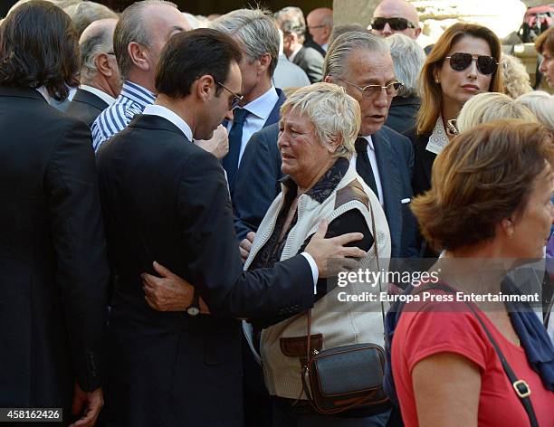 Enrique Ponce and Angela attend the funeral for the Spanish bullfighter Jose Maria Manzanares at Cathedral of San Nicolas on October 30, 2014 in...