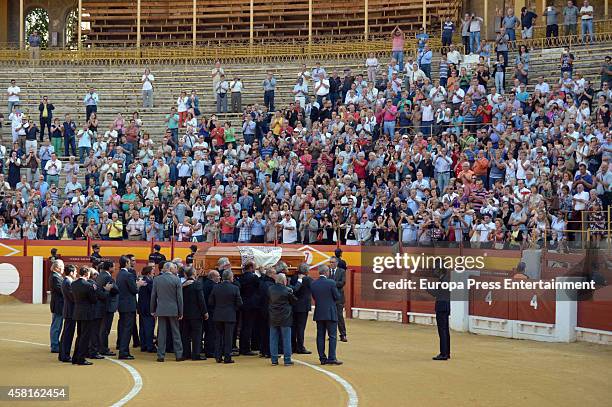 People applaud the bullfighter Jose Maria Manzanares at Alicante bullring on October 30, 2014 in Alicante, Spain.