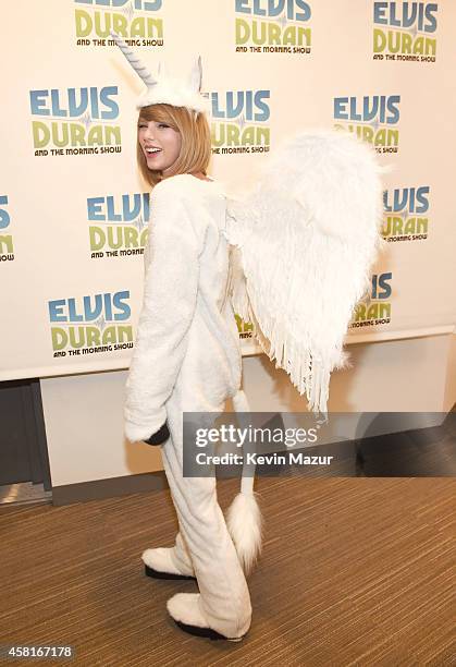 Taylor Swift visits "The Elvis Duran Z100 Morning Show" at Z100 Studio on October 31, 2014 in New York City.