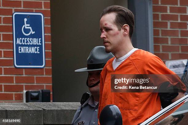 Eric Frein arrives for arraignment to court on October 31, 2014 in Milford, Pennsylvania. Frein, a suspected cop killer, was taken into custody from...