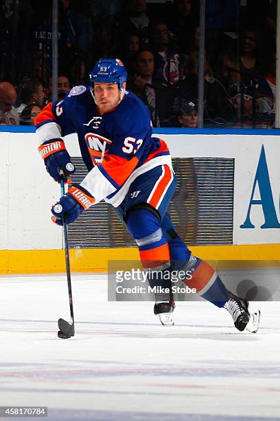Casey Cizikas of the New York Islanders skates against the Toronto Maple Leafs at Nassau Veterans Memorial Coliseum on October 21, 2014 in Uniondale,...