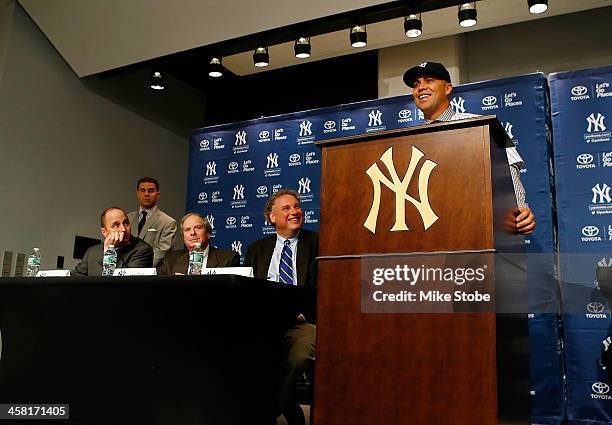 Outfielder Carlos Beltran speaks to the media during his introductory press conference at Yankee Stadium on December 20, 2013 in the Bronx borough of...