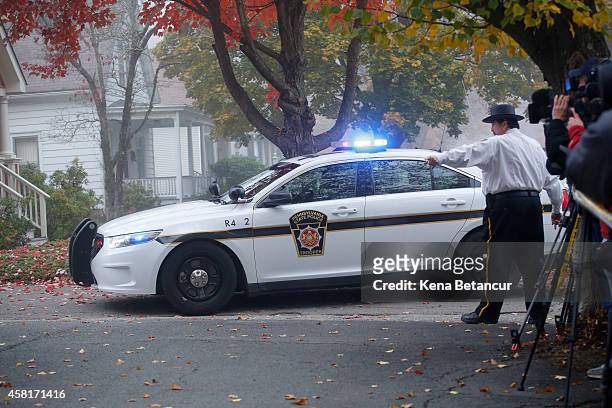 Car that carrying Eric Frein arrives for his first arraignment to court on October 31, 2014 in Milford, Pennsylvania. Frein, a suspected cop killer,...