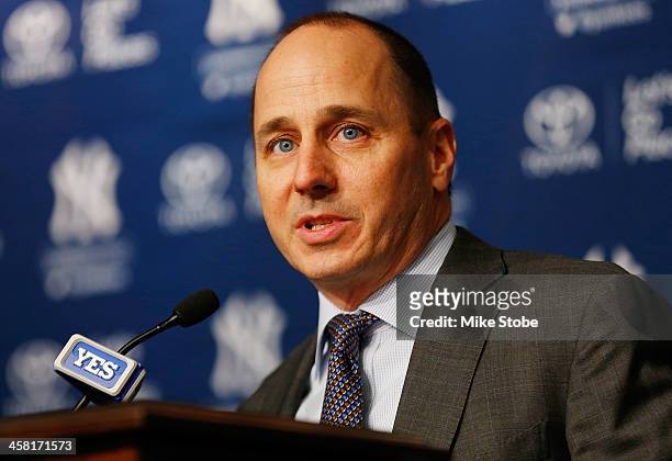 General Manager Brian Cashman speaks to the media during Carlos Beltran's introductory press conference at Yankee Stadium on December 20, 2013 in the...