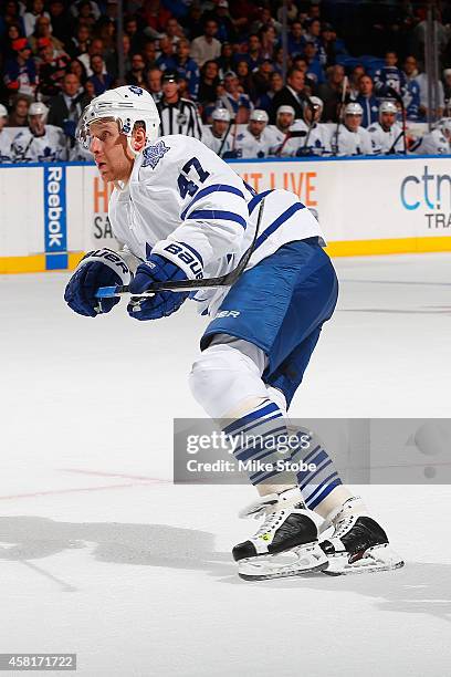 Leo Komarov of the Toronto Maple Leafs skates against the New York Islanders at Nassau Veterans Memorial Coliseum on October 21, 2014 in Uniondale,...