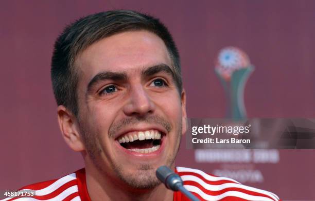 Philipp Lahm smiles during a Bayern Muenchen press conference ahaed of the FIFA Club World Cup Final against Raja Casablanca at Marrakech Stadium on...