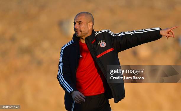 Head coach Josep Guardiola gestures during a Bayern Muenchen training session ahaed of the FIFA Club World Cup Final against Raja Casablanca at...