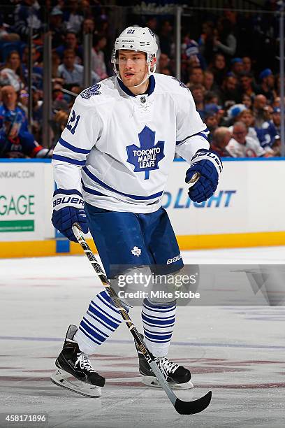 James van Riemsdyk of the Toronto Maple Leafs skates against the New York Islanders at Nassau Veterans Memorial Coliseum on October 21, 2014 in...