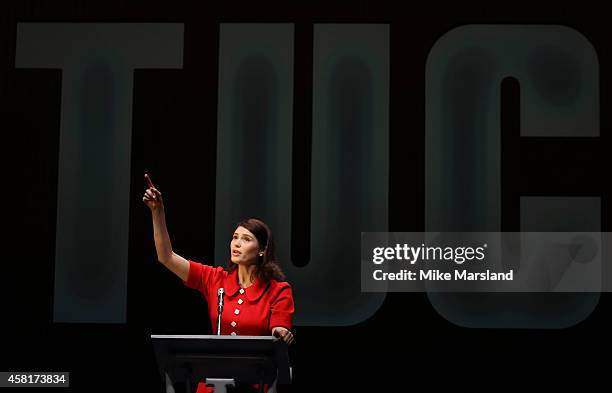Gemma Arterton performs on stage during a photocall for "Made In Dagenham" at Adelphi Theatre on October 31, 2014 in London, England.