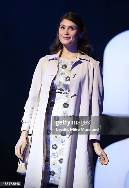 Gemma Arterton performs on stage during a photocall for "Made In Dagenham" at Adelphi Theatre on October 31, 2014 in London, England.