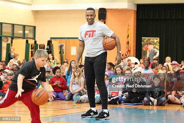 Legend Adrian Dantley speaks during an NBA Fit event at Overlook Elementary school on October 29, 2014 in Linthicum, MD. NOTE TO USER: User expressly...