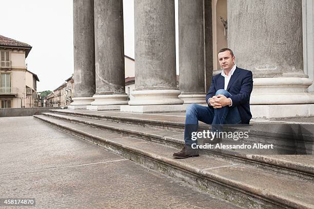 Actor and his wife Andrea Zalone, Germana Pasquero is photographed for Famiglia Cristiana Italy on May 23, 2014 in Turin, Italy.