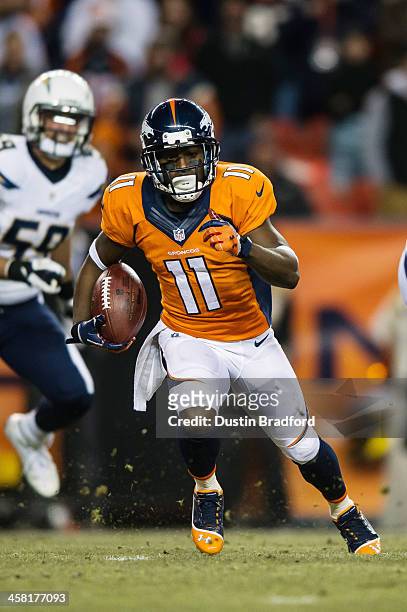 Wide receiver Trindon Holliday of the Denver Broncos returns a kickoff against the San Diego Chargers during a game at Sports Authority Field Field...