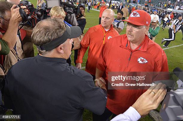 Head coach Chip Kelly of the Philadelphia Eagles and head coach Andy Reid of the Kansas City Chiefs shake hands ager the game at Lincoln Financial...