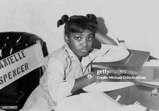 Actress Danielle Spencer from the TV show 'What's Happening!!' does her school work on her dressing room circa 1977 in Los Angeles, California.