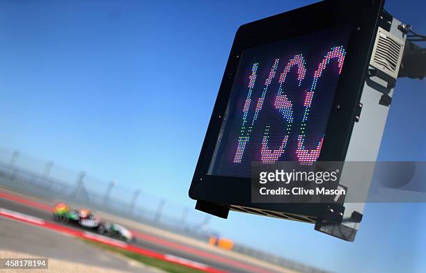 Sign displays the message 'VSC' as teams trial the new Virtual Safety Car following Jules Bianchi of France and Marussia's accident in Suzuka during...