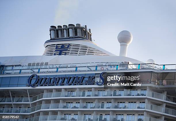 People sit and enjoy the facilites on the top deck onboard the cruise ship Quantum of the Seas which is currently docked at Southampton on October...