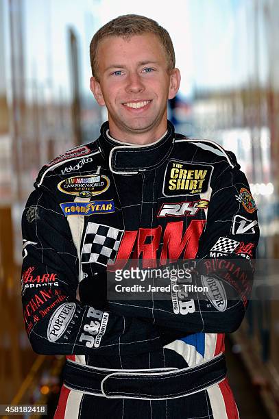 Caleb Roark, driver of the Grimes Irrigation & Construction Chevrolet, poses for a portrait prior to Pinnacle Propane Qualifying for the NASCAR...