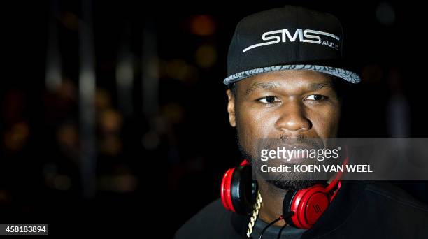 Rapper 50 Cent smiles during the release party of his new SMS Audio headphones in the Heineken Music Hall, in Amsterdam, the Netherlands, on October...