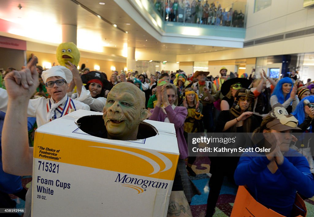Staff at Children's Hospital Colorado dress in Halloween costumes and perform a surprise flash mob for patients and visitors inside the hospital atrium.