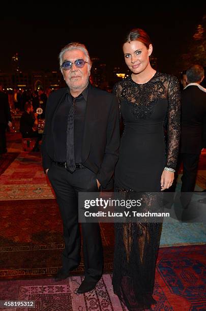 Roberto Cavalli and Sandra J Bergman attend the Gala Event during the Vogue Fashion Dubai Experience on October 31, 2014 in Dubai, United Arab...