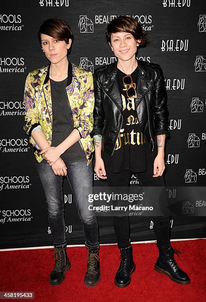 S Sara Quin and Tegan Quin of Tegan and Sara attend Y100s Jingle Ball 2013 Presented by Jam Audio Collection at BB&T Center on December 20, 2013 in...