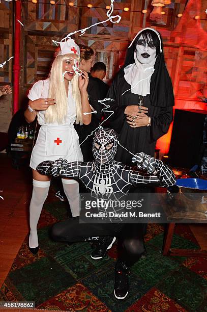 Leah Weller, Natt Weller and Tomo Kurata attend 'Death Of A Geisha' hosted by Fran Cutler and Cafe KaiZen with Grey Goose on October 31, 2014 in...