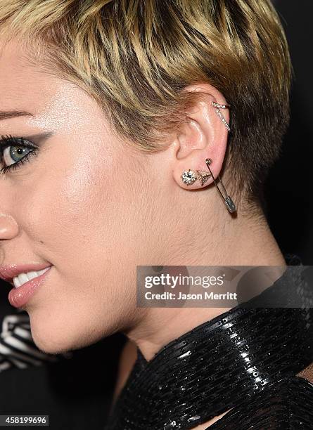 Singer Miley Cyrus attends the 2014 amfAR LA Inspiration Gala at Milk Studios on October 29, 2014 in Hollywood, California.