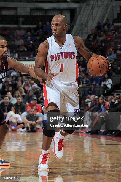 Chauncey Billups of the Detroit Pistons dribbles the ball against the Charlotte Bobcats on December 20, 2013 at The Palace of Auburn Hills in Auburn...