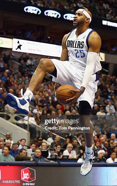 Vince Carter of the Dallas Mavericks drives to the basket against the Toronto Raptors at American Airlines Center on December 20, 2013 in Dallas,...