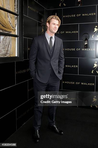 Chris Hemsworth poses at the Johnnie Walker Marquee on Derby Day at Flemington Racecourse on November 1, 2014 in Melbourne, Australia.