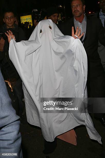 Singer Lady Gaga leaves the 'Matignon' restaurant with a Halloween costume on November 1, 2014 in Paris, France.