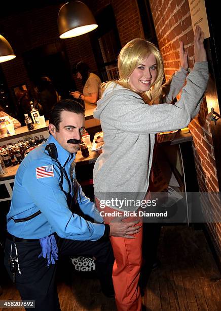 Keifer Thompson and Shawna Thompson of Thompson Square pose backstage during The Big 98's 2nd Annual Battle for the Bones Halloween Music Festival on...