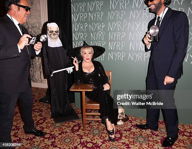 Michael Kors, Bette Midler and Lance LePere attend the 19th Annual Hulaween Gala: Fellini Hulaweeni at the Waldorf-Astoria on October 31, 2014 in New...