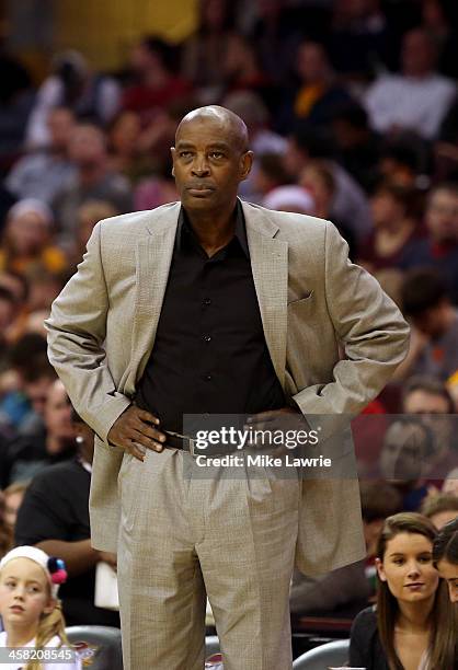 Head Coach Larry Drew of the Milwaukee Bucks looks on from the bench against the Cleveland Cavaliers at Quicken Loans Arena on December 20, 2013 in...