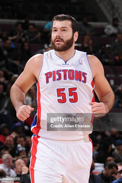 Josh Harrellson of the Detroit Pistons runs up court against the Charlotte Bobcats on December 20, 2013 at The Palace of Auburn Hills in Auburn...