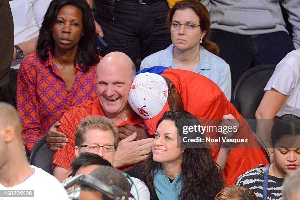 Clipper Darrell hugs Los Angeles Clippers owner Steve Ballmer at a basketball game between the Los Angeles Clippers and the Los Angeles Lakers at...