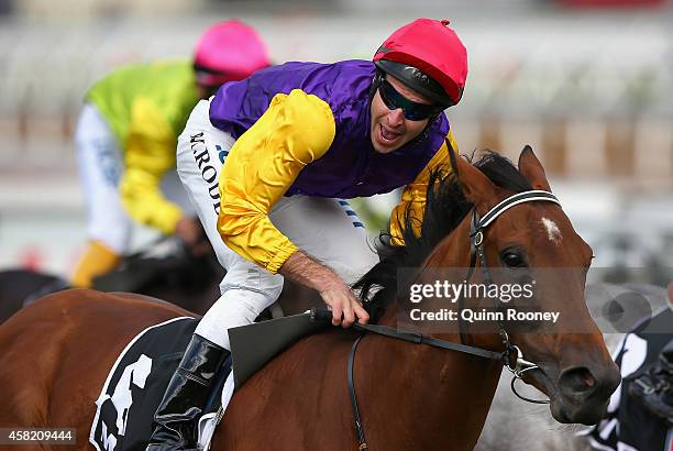 Michael Rodd riding Bonaria reacts after winning the Myer Classic on Derby Day at Flemington Racecourse on November 1, 2014 in Melbourne, Australia.