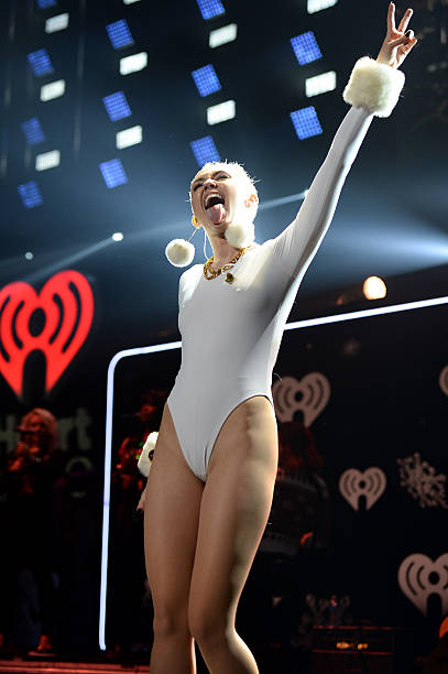 Miley Cyrus performs onstage during Y100's Jingle Ball 2013 Presented by Jam Audio Collection at BB&T Center on December 20, 2013 in Miami, Florida.