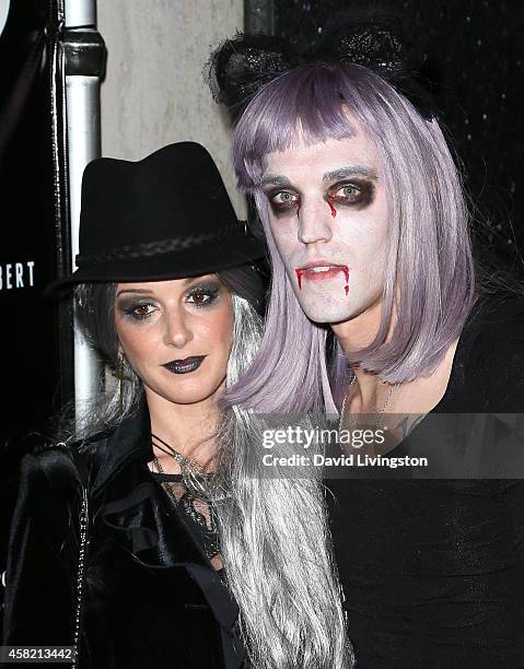 Actress Shenae Grimes-Beech and husband musician Josh Beech attend Adam Lambert's 2nd Annual Halloween Bash at Bootsy Bellows on October 31, 2014 in...