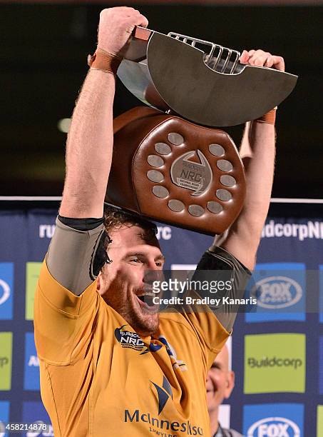 David McDuling of Brisbane City holds up the winners trophy after the 2014 NRC Grand Final match between Brisbane City and Perth Spirit at Ballymore...