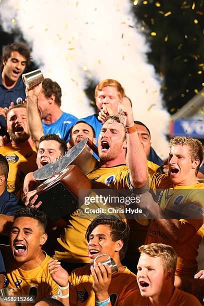 David McDuling of Brisbane City holds up the winners trophy after the 2014 NRC Grand Final match between Brisbane City and Perth Spirit at Ballymore...