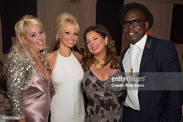 Gina de Franco executive producer and creator of the Better World Awards, actress Pamela Anderson, Olivia Gaynor Long, and Kweku Mandela attend the...