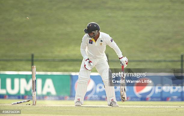 Ahmed Shehzad of Pakistan is bowled by Mitchell Johnson of Australia during Day Three of the Second Test between Pakistan and Australia at Sheikh...