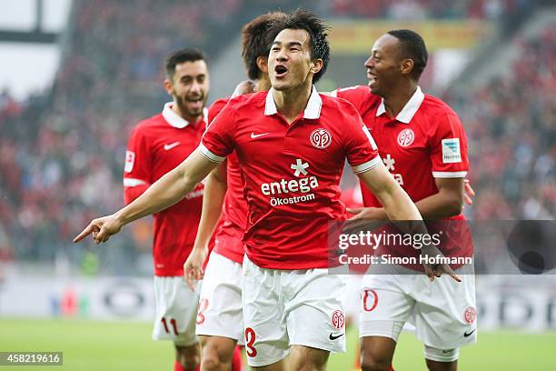 Shinji Okazaki of Mainz celebrates his team's first goal during the Bundesliga match between 1. FSV Mainz 05 and SV Werder Bremen at Coface Arena on...