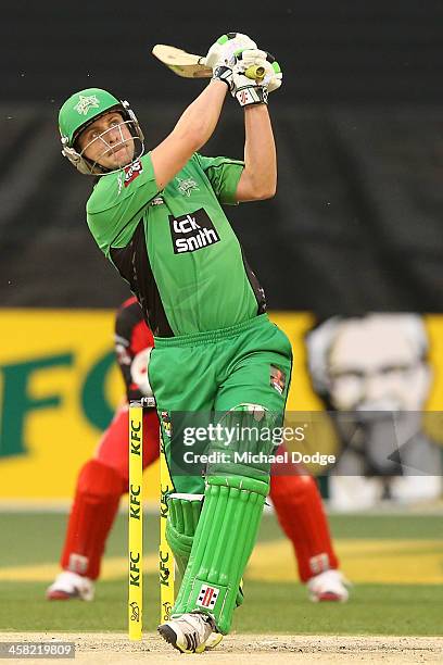 Luke Wright of the Stars hits a six off the bowling of Will Sheridan of the Renegades during the Big Bash League match between the Melbourne Stars...