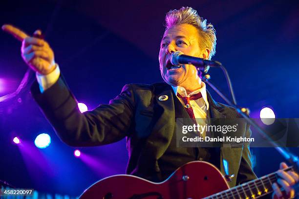 Brian Setzer performs with The Brian Setzer Orchestra during their Christmas Rocks 10th Anniversary Tour at Belly Up Tavern on December 20, 2013 in...