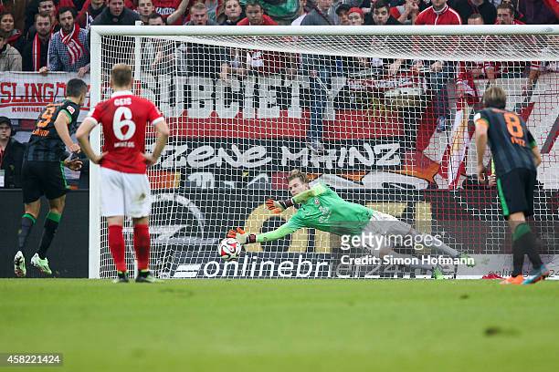 Goalkeeper Loris Karius of Mainz saves a penalty shot of Franco di Santo of Bremen during the Bundesliga match between 1. FSV Mainz 05 and SV Werder...